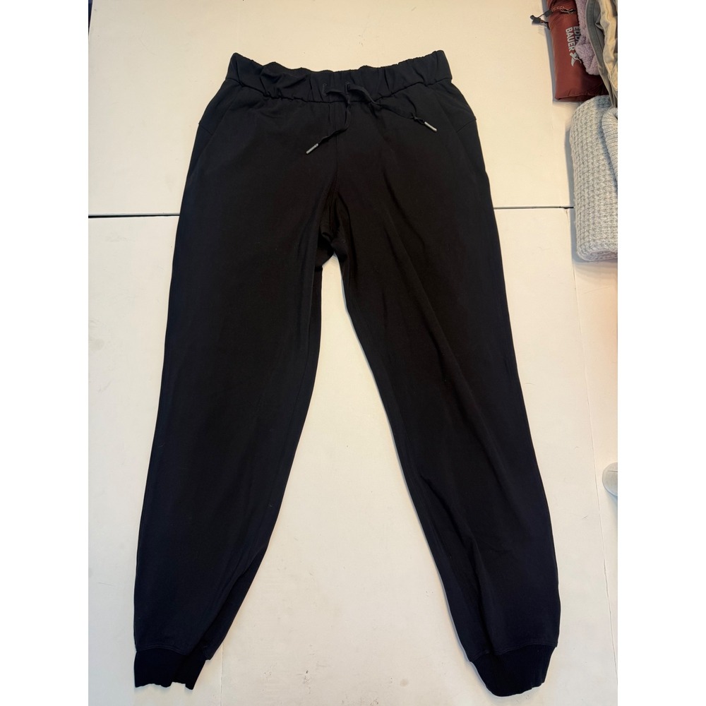 Lululemon On the Fly Jogger Black Luxtreme Drawstring Pants 7/8 Length Size 6